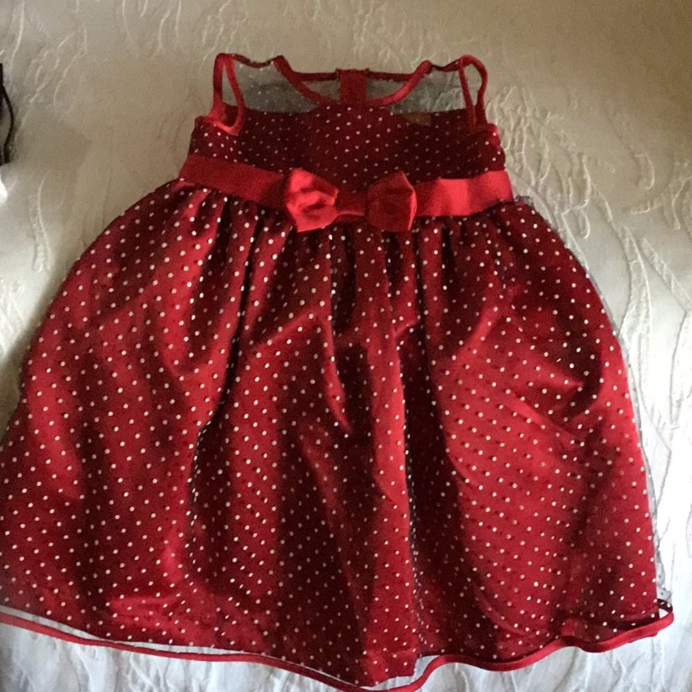 Girl’s adorable red polka dot Christmas dress